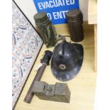A WW2 gas mask in original metal case, together with other related ephemera, including an