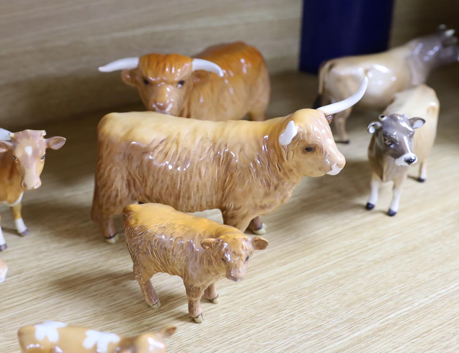 A Beswick Highland bull, cow and calf, a similar Freisian bull, cow and calf and a Dulsby Coy Boy, - Image 3 of 5