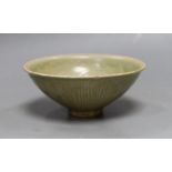A Chinese carved Yaozhou celadon bowl, Northern Song Dynasty, 15.5cms high