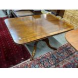A Regency banded mahogany rectangular tilt top dining table, length 141cm, depth 106cm, height 75cm