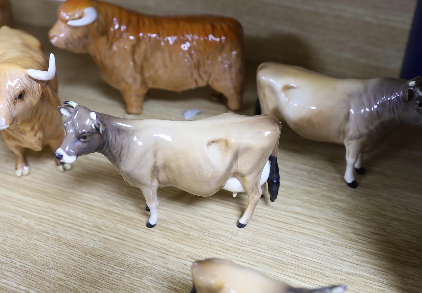 A Beswick Highland bull, cow and calf, a similar Freisian bull, cow and calf and a Dulsby Coy Boy, - Image 4 of 5