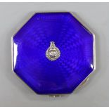 A George VI octagonal silver and blue enamel compact, with regimental appliqué, Birmingham, 1937,