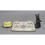 A Samson Paris inkstand and a porcelain box and cover and a porcelain model of a Scots terrier,