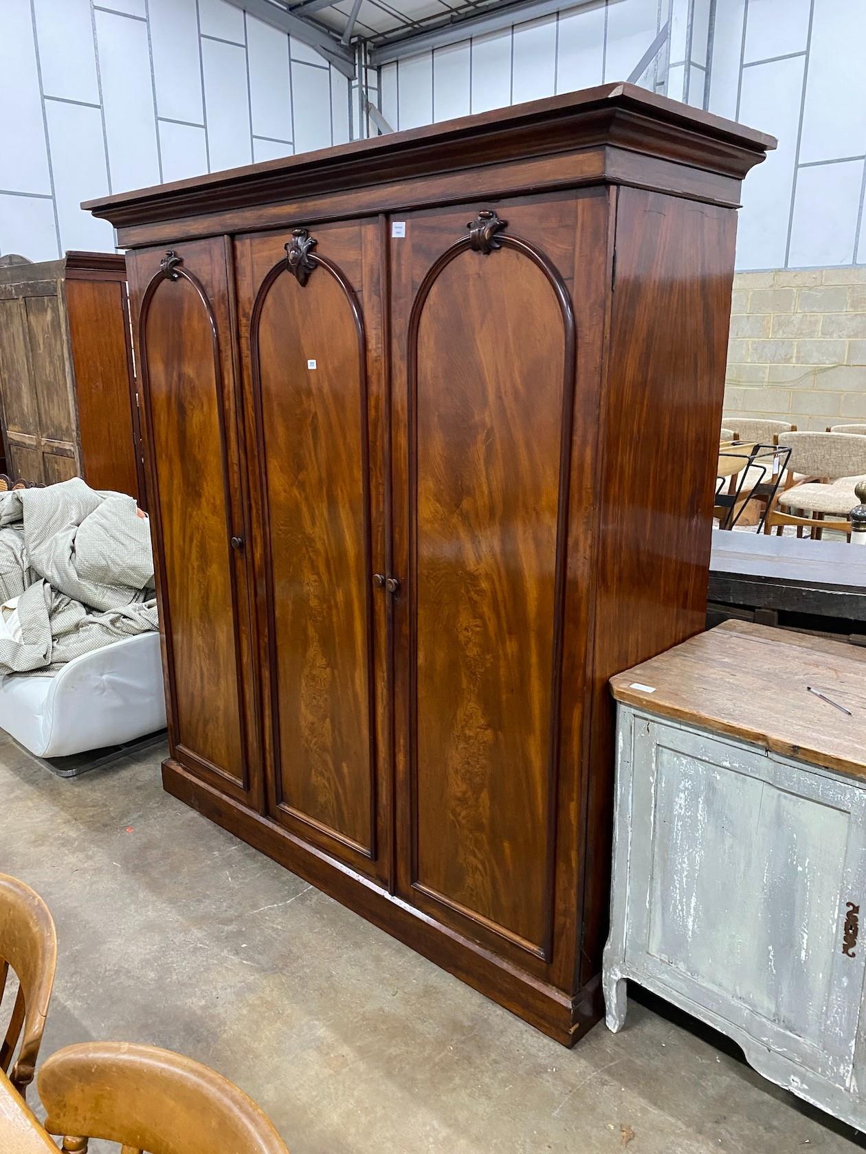 A Victorian mahogany compactum wardrobe, length 199cm, depth 65cm, height 208cm