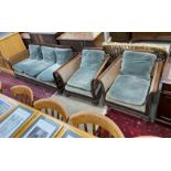 An early 20th century mahogany single caned three piece bergere suite, settee length 182cm, depth