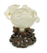 A Chinese small carved agate brushwasher on wooden stand, 19th century