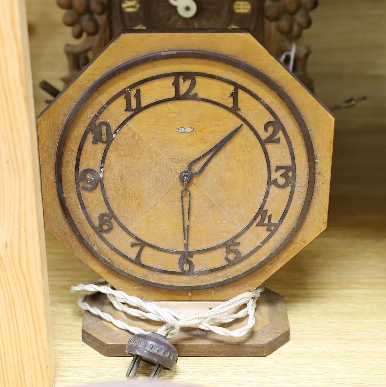 A Black Forest cuckoo clock, together with another octagonal faced timepiece, a Bakelite timepiece - Image 4 of 5