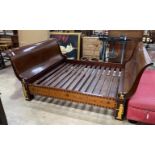 A reproduction Egyptian style inlaid gilt metal mounted mahogany sleigh bedframe, width 193cm,