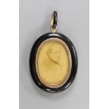 A Victorian black enamelled yellow metal oval locket, set with an old cut white sapphire, overall