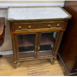 A pair of French brass mounted marble topped glazed mahogany pier cabinets, width 64cm, depth