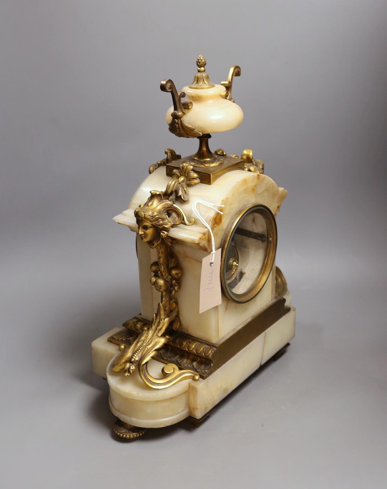 A late 19th century French ormolu mounted alabaster mantel clock. 42cm tall - Image 2 of 3