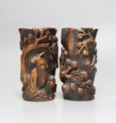 A pair of Chinese carved bamboo brush pots, late Qing dynasty, carved in high relief with a sage