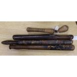 Four 19th century treen truncheons, longest 46cm