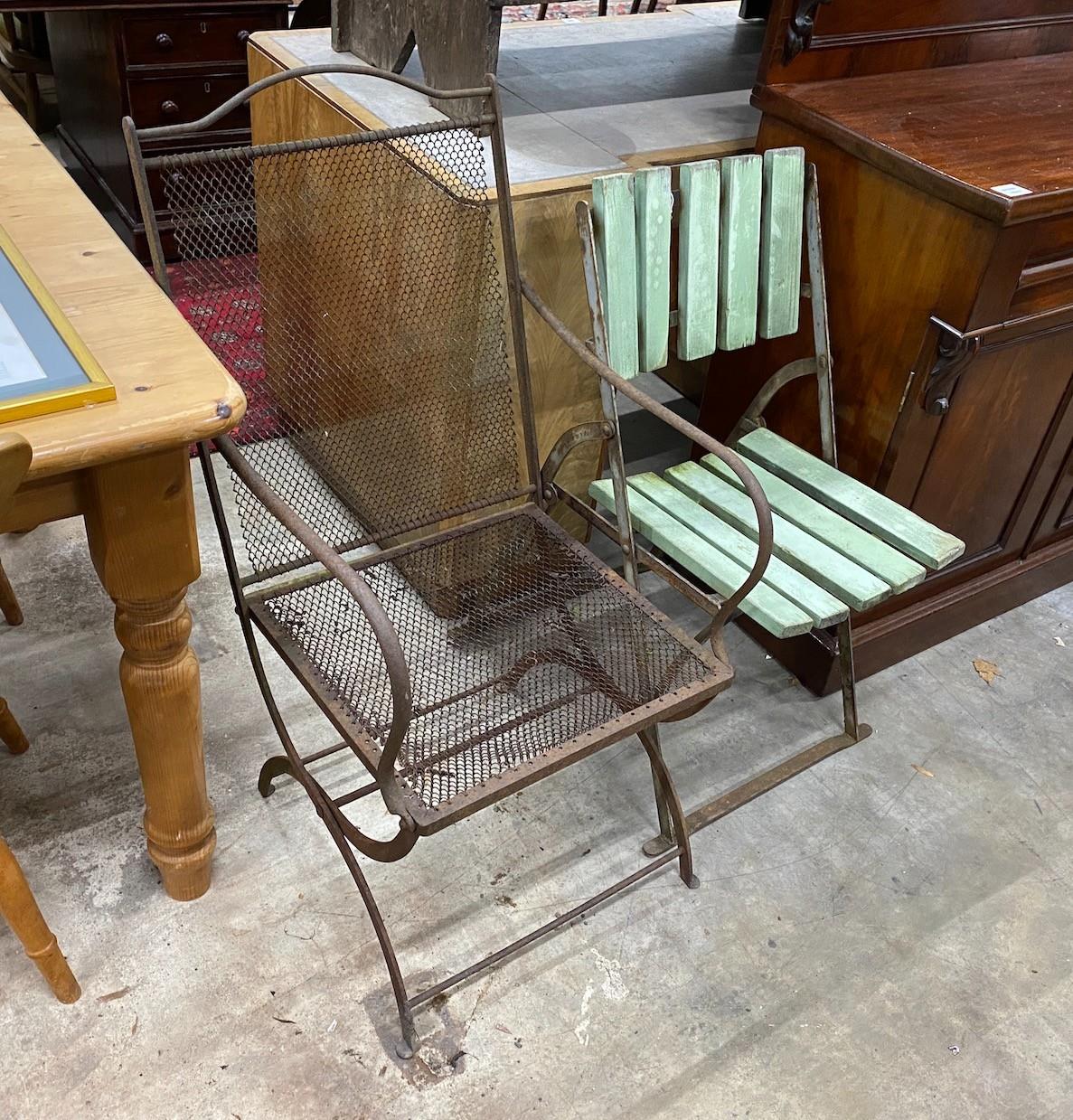 A Victorian folding iron garden chair and a later folding garden chair