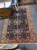 An antique Malaya rug, 210 x 148cm