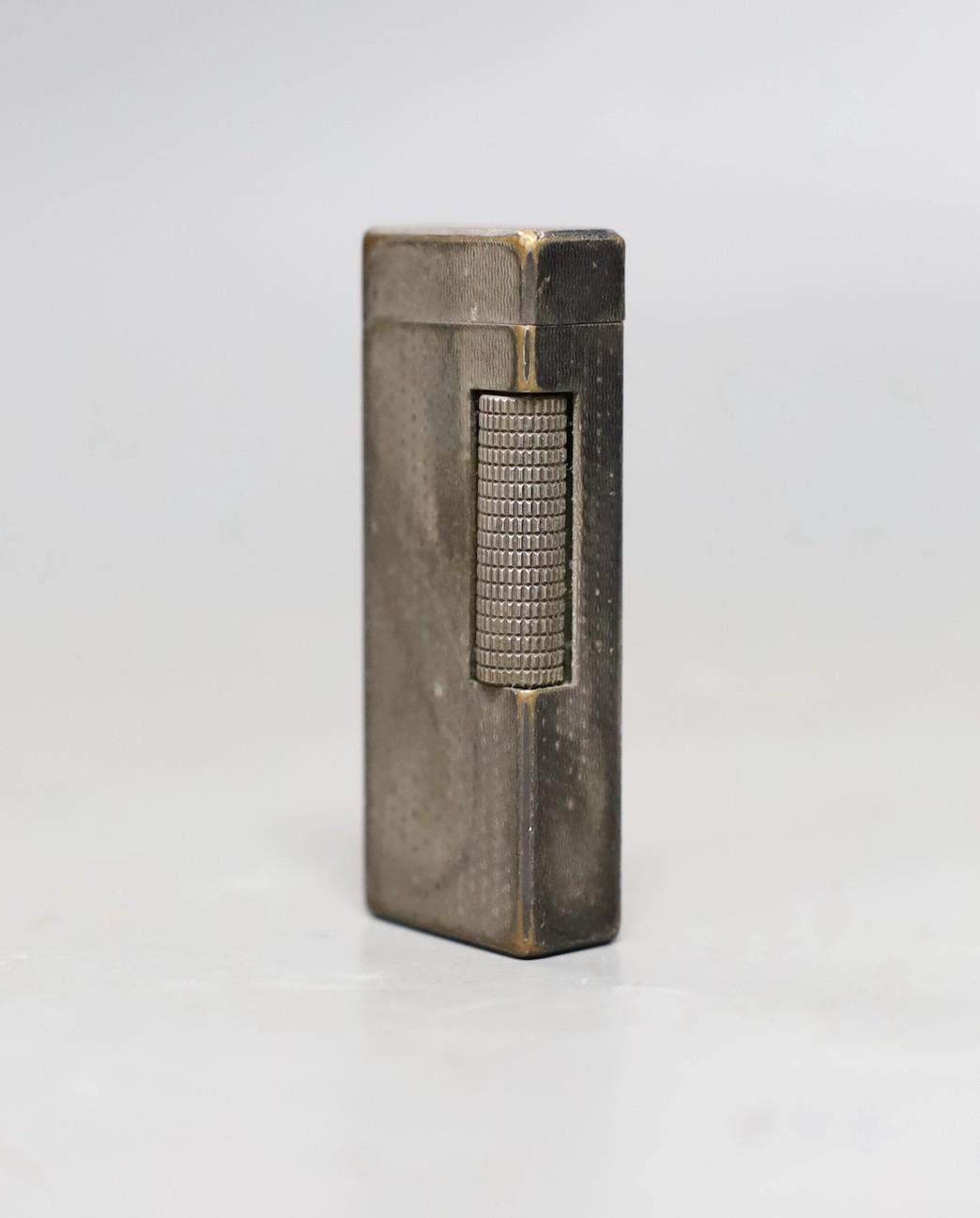 A Dunhill silver plated lighter, 6.5cms high - Image 2 of 3