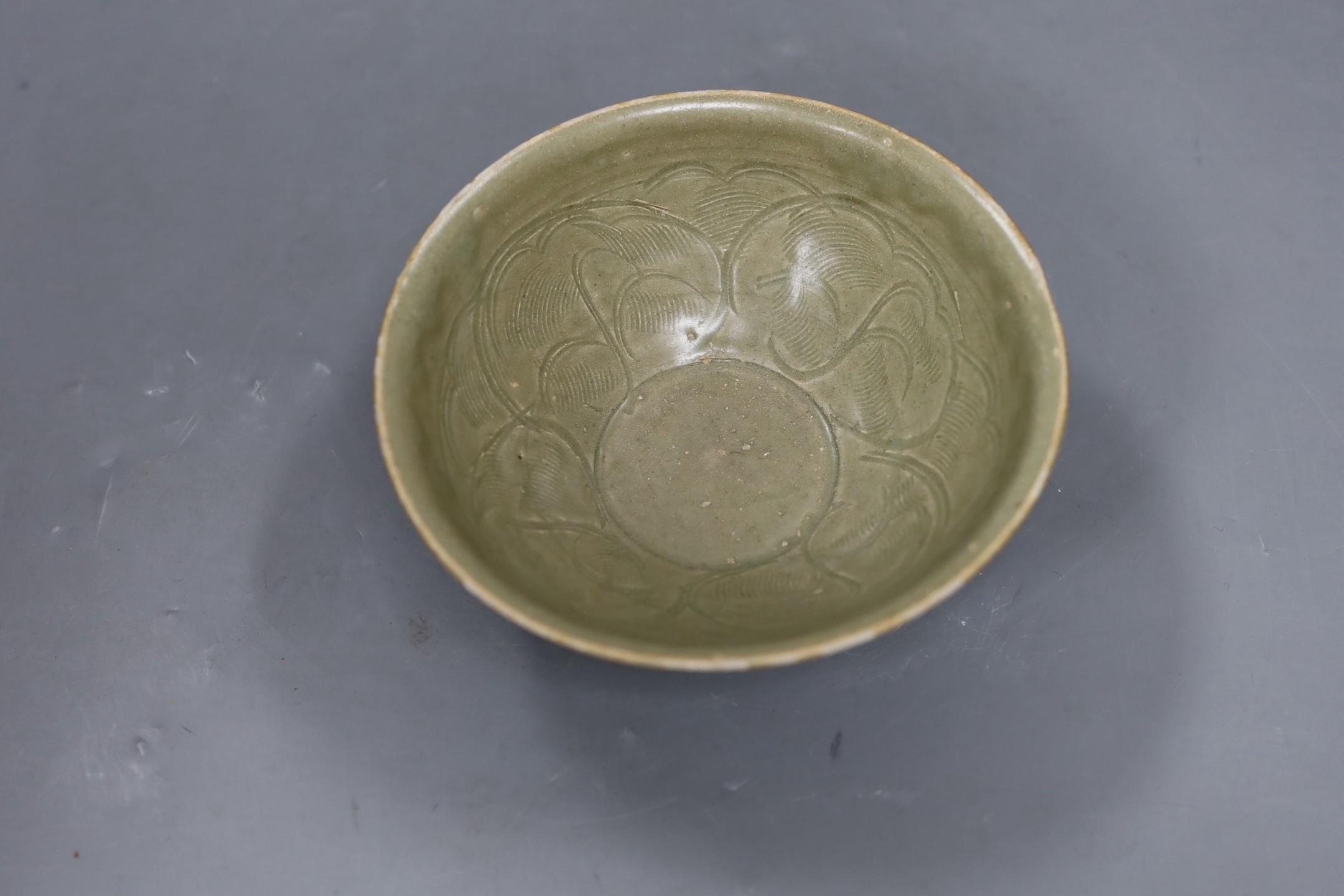 A Chinese carved Yaozhou celadon bowl, Northern Song Dynasty, 15.5cms high - Image 3 of 4