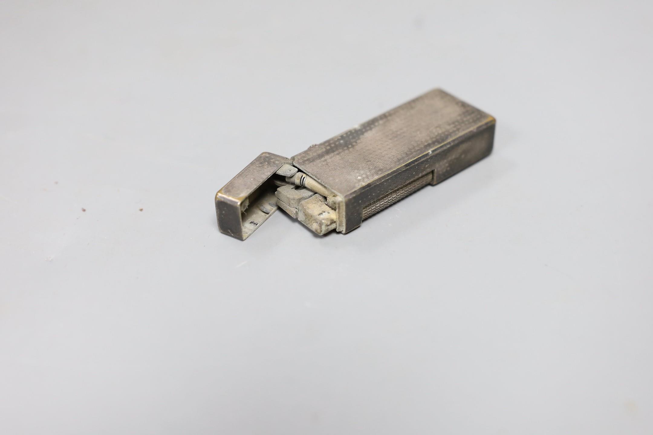 A Dunhill silver plated lighter, 6.5cms high - Image 3 of 3