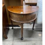 A mid 18th century feather banded mahogany D shaped hinged top side table, width 76cm, depth 46cm,