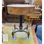 An early 20th century French gilt metal mounted part ebonised bird's eye maple oval work table,
