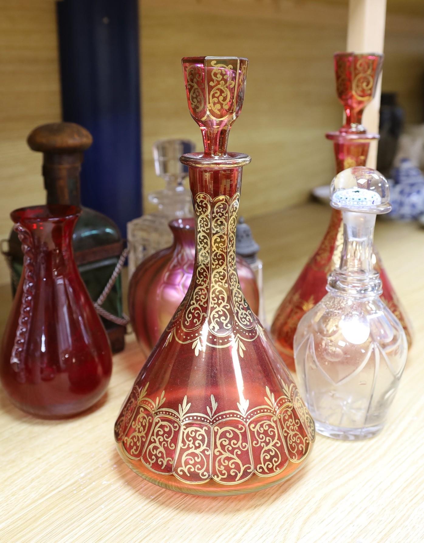 A pair of Bohemian gilded ruby glass decanters and stoppers, a Bohemian ‘millefiori paperweight’ - Image 2 of 5