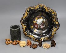 A Chinese soapstone brush pot and a group of netsuke and a papier mache dish, 26cms diameter,