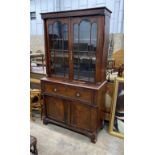 A Regency mahogany secretaire bookcase, width 121cm, depth 52cm, height 223cm Ivory submission