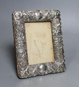 A late Victorian repousse silver mounted rectangular photograph frame, John Newton Mappin, London,