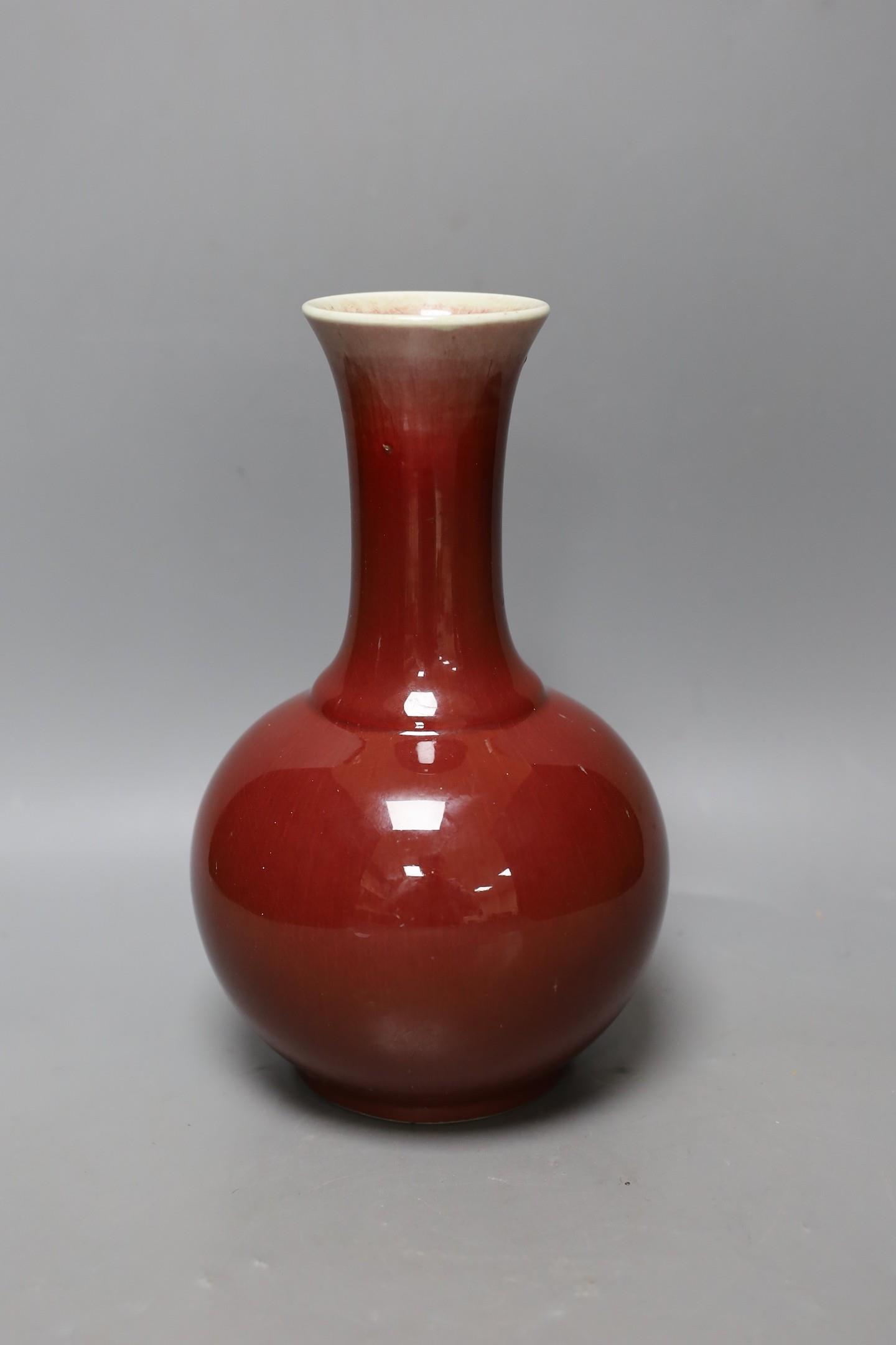 A Chinese ox blood bottle vase, mark to base 27cm - Image 2 of 4