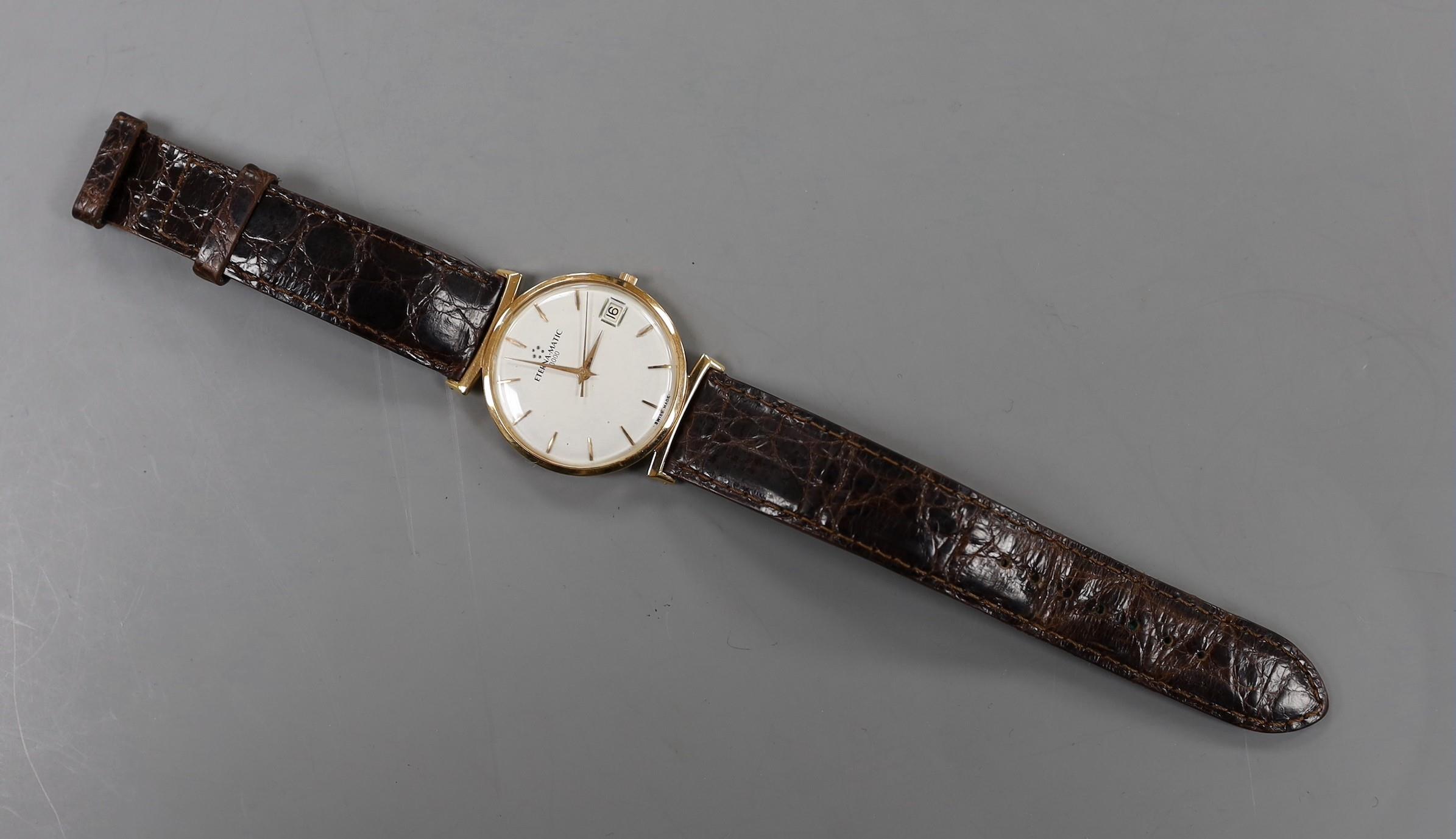 A gentleman's yellow metal Eterna-Matic wrist watch, with date aperture, on associated leather strap - Image 2 of 3