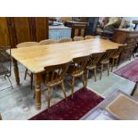 A large Victorian style rectangular pine kitchen table, length 305cm, depth 105cm, height 76cm and