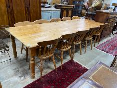 A large Victorian style rectangular pine kitchen table, length 305cm, depth 105cm, height 76cm and