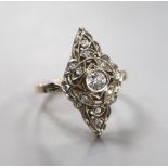 A 1950's Soviet 583 yellow metal (14k) and diamond set marquise cluster ring, size P/Q, gross weight