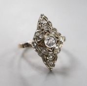 A 1950's Soviet 583 yellow metal (14k) and diamond set marquise cluster ring, size P/Q, gross weight
