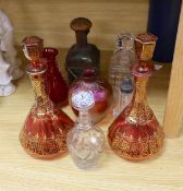 A pair of Bohemian gilded ruby glass decanters and stoppers, a Bohemian ‘millefiori paperweight’