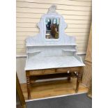 A 19th century French mahogany marble top washstand with high mirrored back, width 130cm, depth