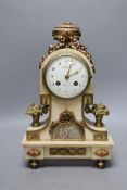 A 19th century French alabaster and phosphur bronze mounted mantel clock with a painted demi lune