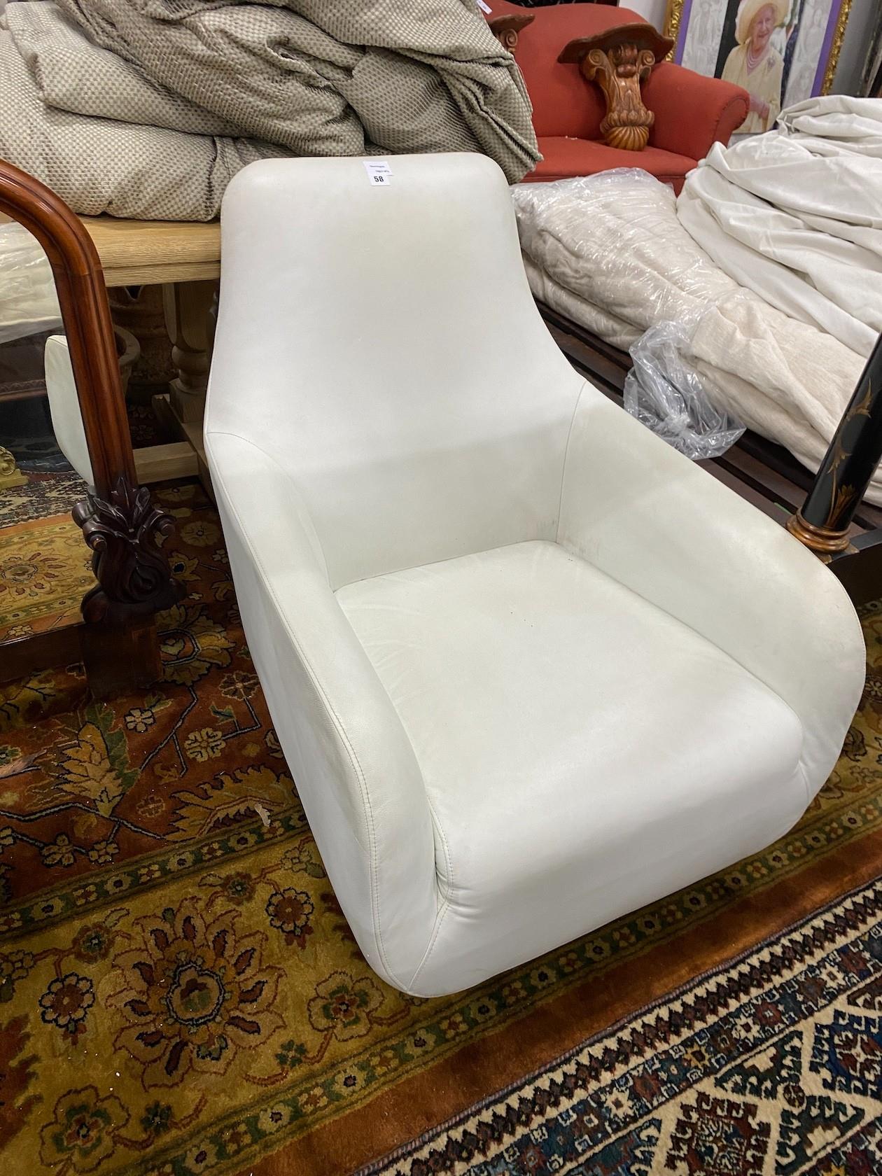 A Ligne Roset white leather armchair, width 70cm, depth 90cm, height 86cm