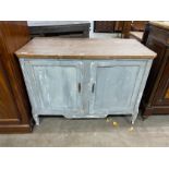 A 19th century French part painted oak and pine two door cupboard, width 127cm, depth 62cm, height