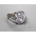 A white metal (stamped Plat) and fancy cut singe stone cubic zirconia set dress ring, with cubic