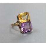 A mid 20th century 9ct gold, amethyst and citrine set two stone dress ring, size N, gross