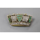 An early 20th century yellow metal, emerald and diamond set coronet brooch, 30mm, gross weight 4.4