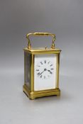 A French brass repeating carriage clock. 18cm tall