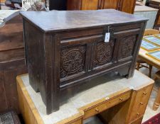 A late 17th / early 18th century panelled carved oak coffer, length 101cm, depth 49cm, height 64cm