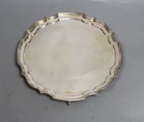 A modern silver salver with scroll feet and inscription verso, maker, HB, London, 1972, 25.3cm, 14.