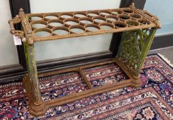 A Victorian Coalbrookdale style cast iron Country House 24 division stick stand, width 97cm, depth