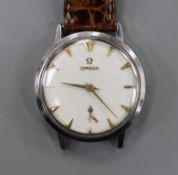 A gentleman's stainless steel Omega manual wind wrist watch, (numeral loose and part of strap