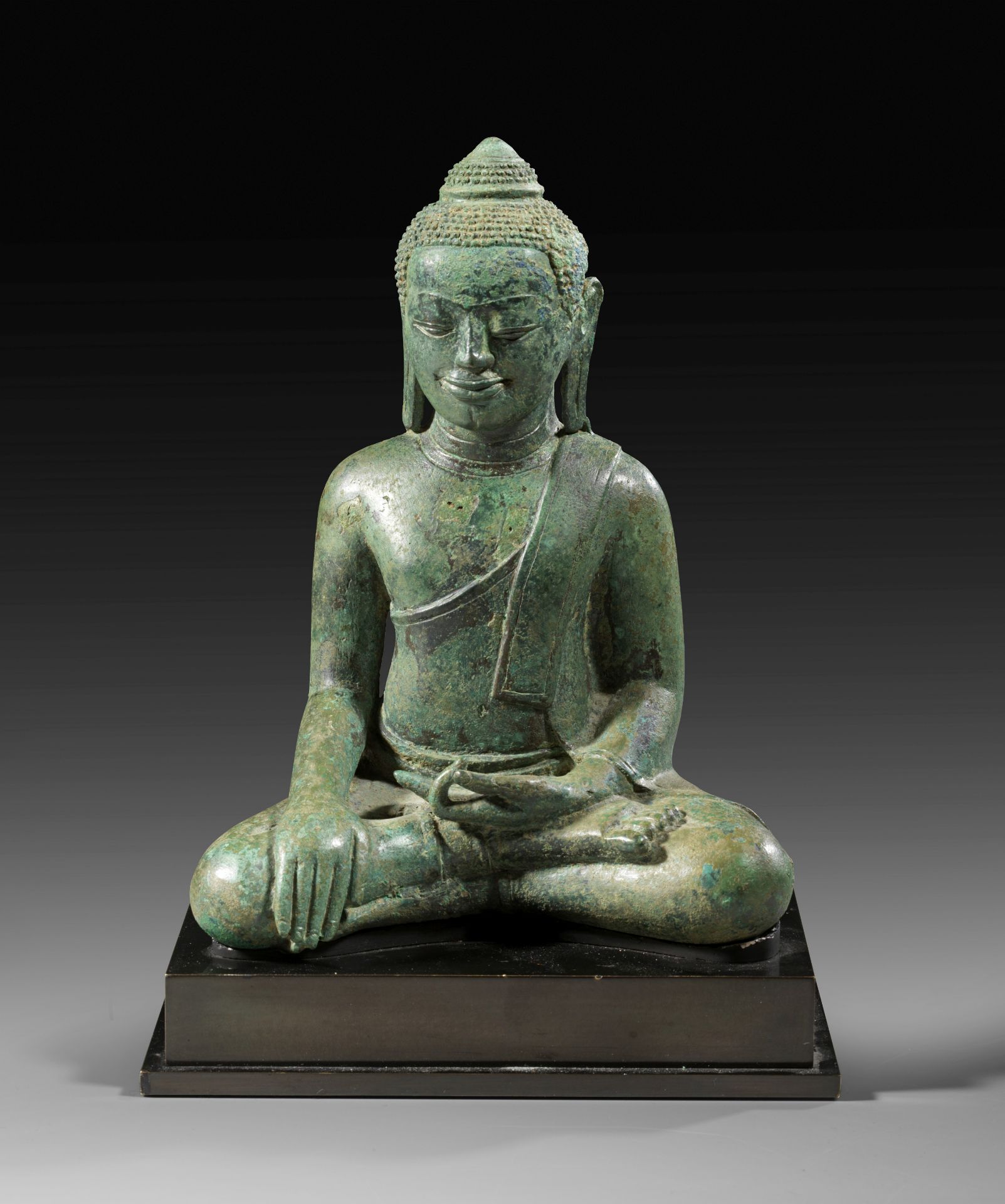 Extraordinary and rare bronze figure of Buddha Maravijaya. 