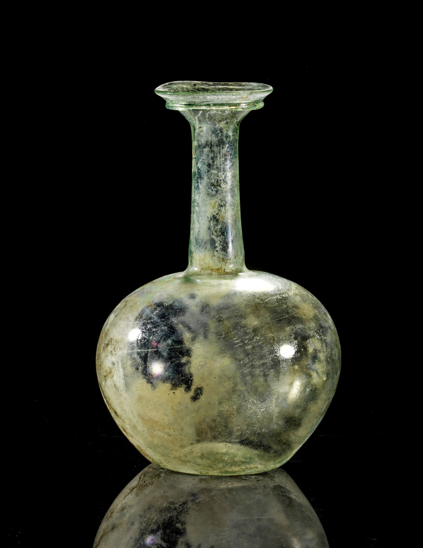 Large Roman globular glass flask of clear glass.