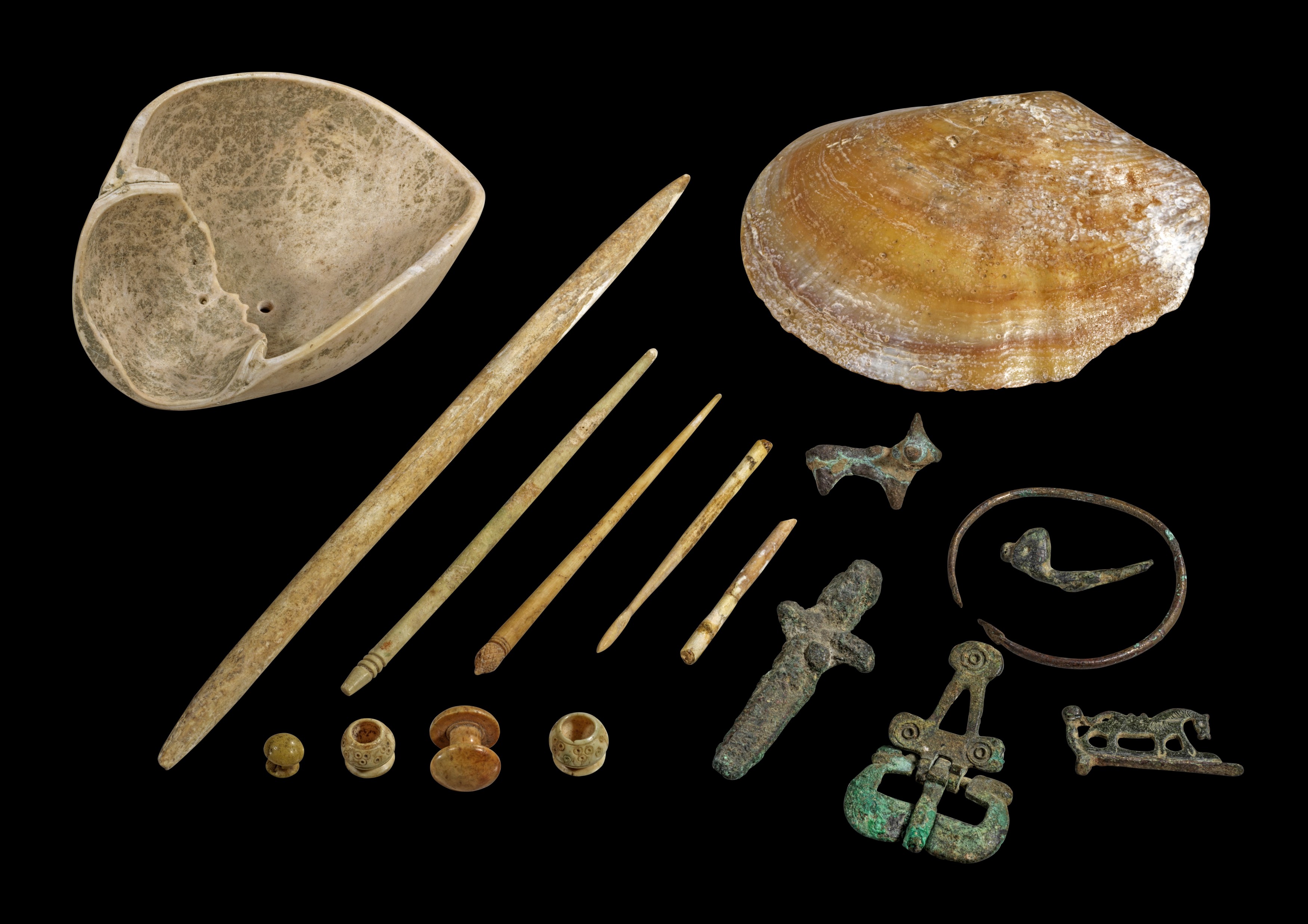 Collection of small objects from bronze, bone and  shell lime. 